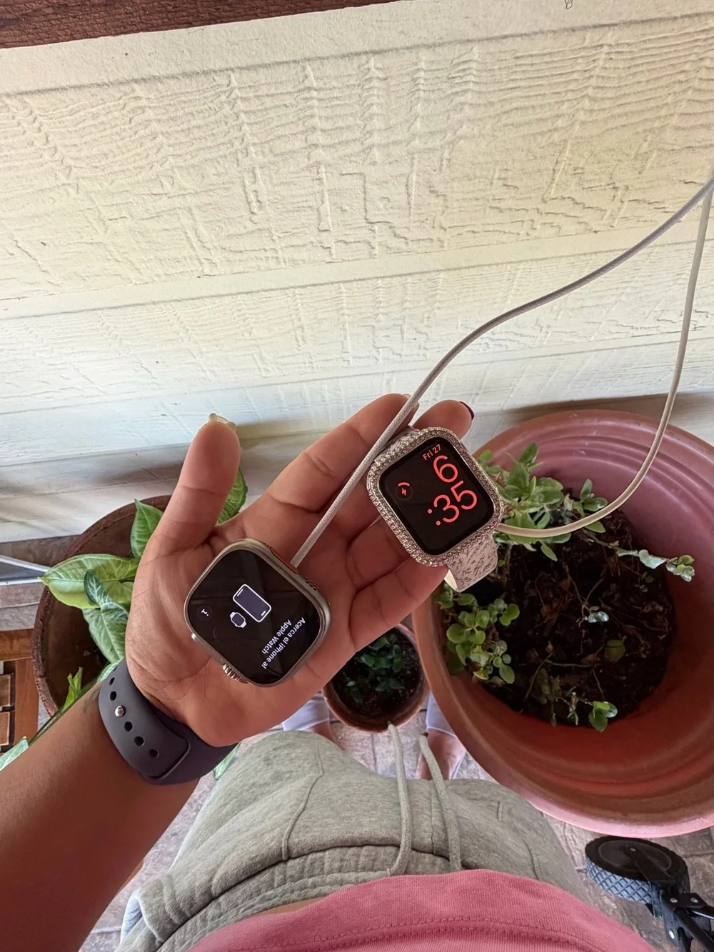 Apple Watch with Pink Woven and Gray Silicone Sport Bands